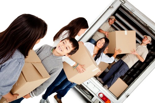 Moving boxes being loaded by a Ruislip Man And Van service