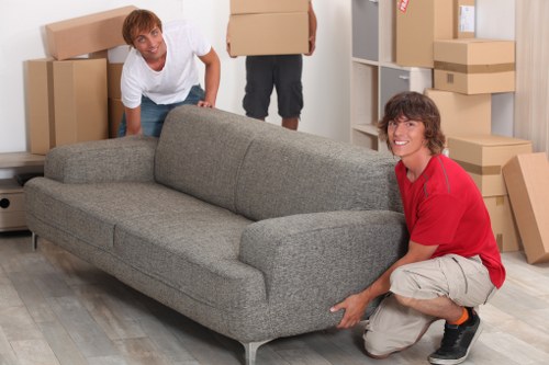 Man and van moving boxes and furniture during a UK removal job