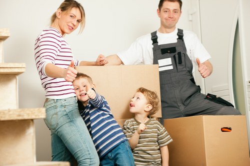 Packed moving boxes and furniture prepared for removals in Ruislip